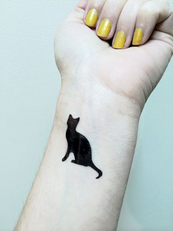 gato negro tatuaje