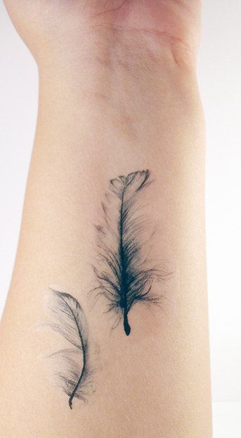 pluma tatuajes